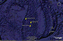 18.0°N, 136.0°E (Typhoon Forrest in the Northwest Pacific Ocean)